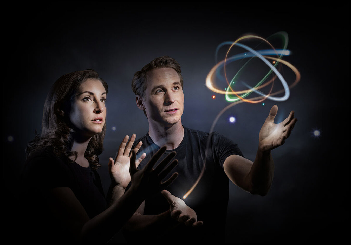 Man and woman with light-sign